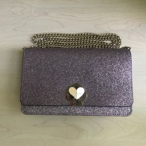 Nicola Shimmer Twistlock Chain Wallet In Lilac